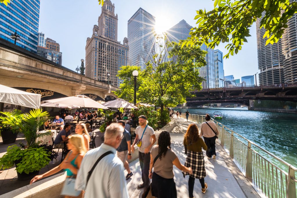 People strolling and dining on the riverwalk